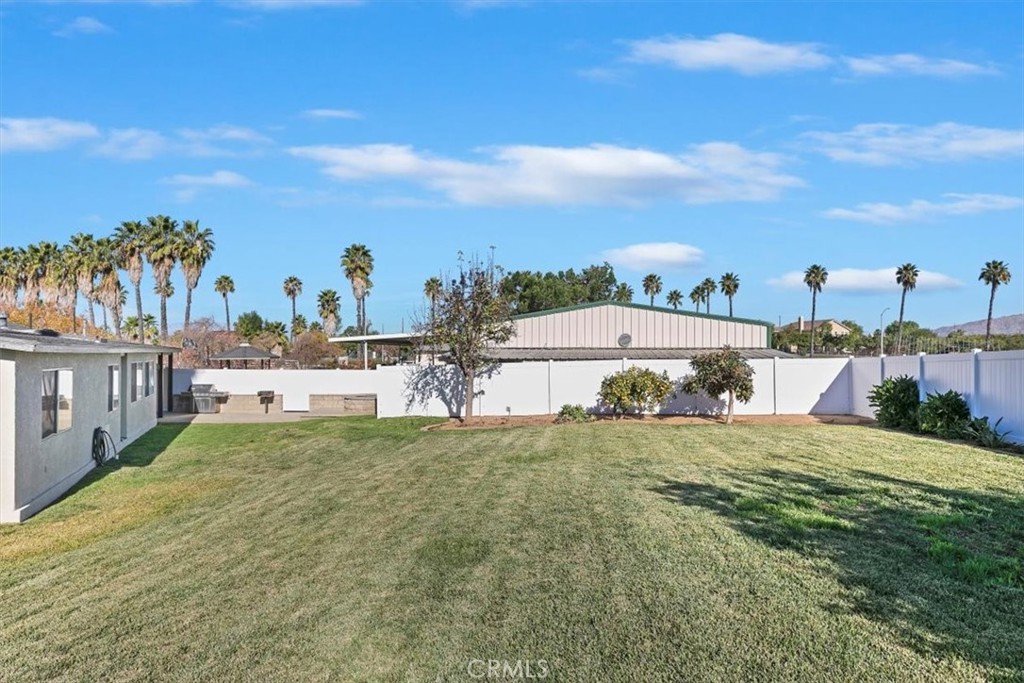 18590 Roberts Road Riverside, CA 92508 - Photo 45 of 66 a view of a house with a yard and sitting area