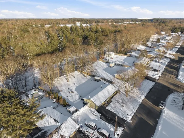 an aerial view of a city with ocean view
