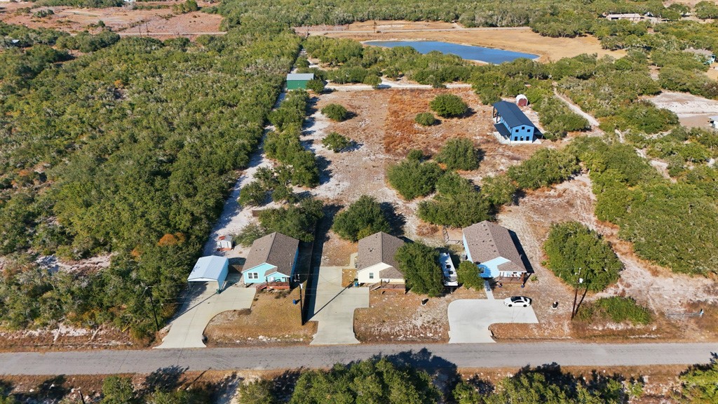 2121 Lone Star Road Rockport, TX 78382 - Photo 29 of 29 an aerial view of a house with a yard
