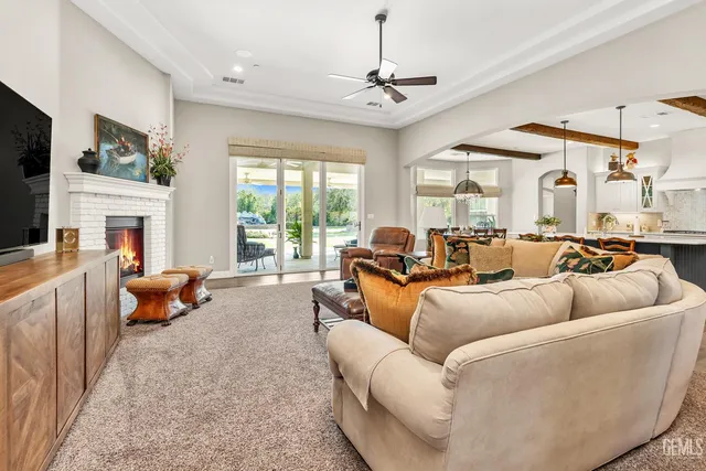 a en suite bathroom with a granite countertop sink and a mirror