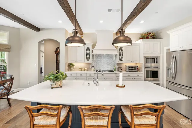 a view of a house with swimming pool and yard with green space