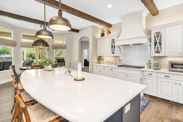 a view of a house with swimming pool and a yard