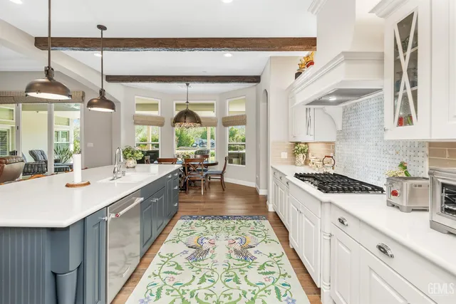 a backyard of a house with flower plants