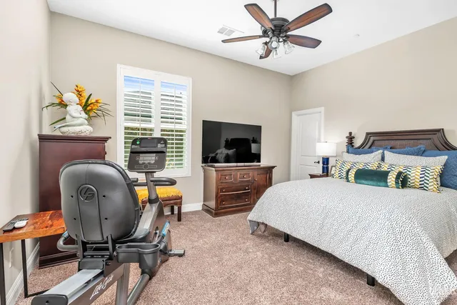 an aerial view of a house with outdoor space
