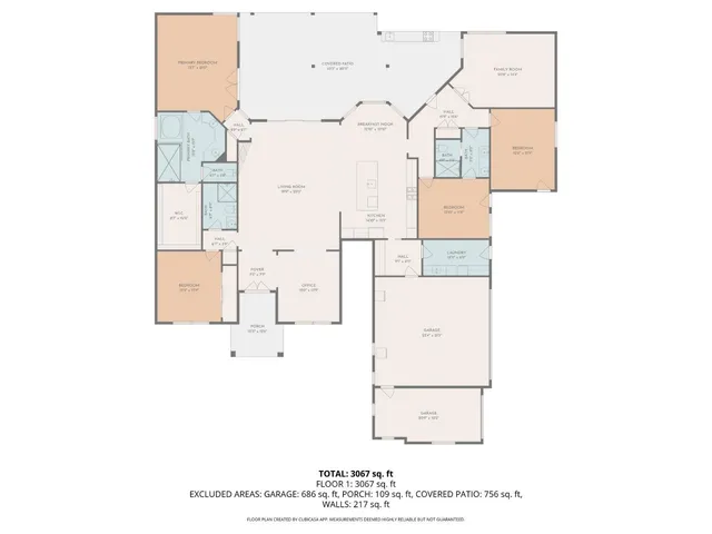a large kitchen with stainless steel appliances granite countertop a lot of counter space and wooden floors