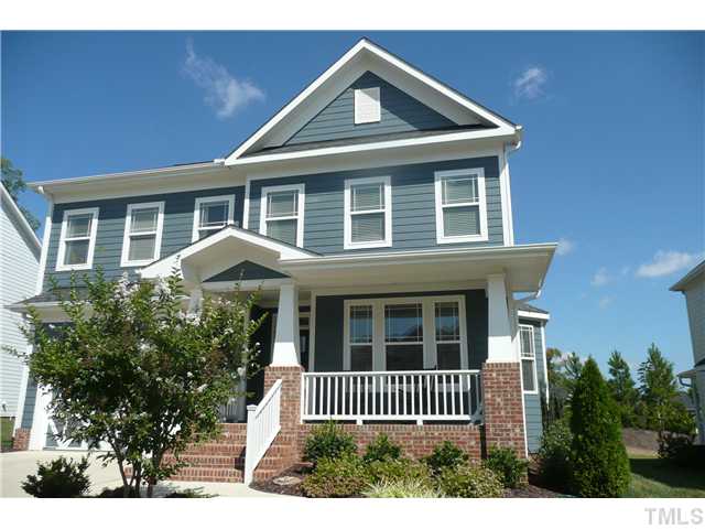 2755 Hidden Waters Circle Raleigh, NC 27614 - Photo 1 of 19 Welcoming Rocking Chair front porch, landscaped yard, fiber cement siding
