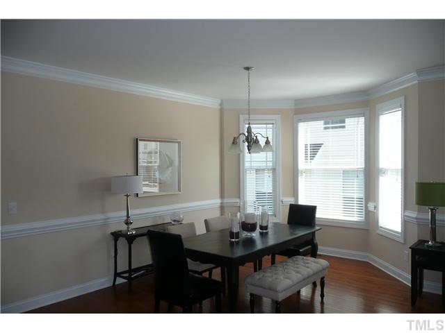 2755 Hidden Waters Circle Raleigh, NC 27614 - Photo 4 of 19 Formal Dining Room has a beautiful bay window, crown molding, chair rail and again , beautiful hardwood floors.