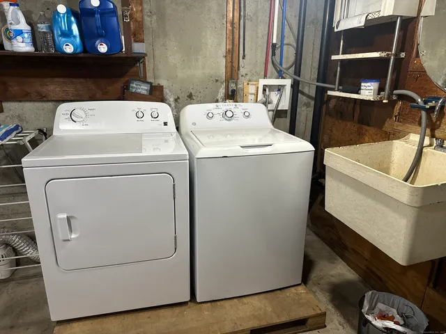 a utility room with dryer and washer