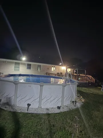 a view of a backyard of the house