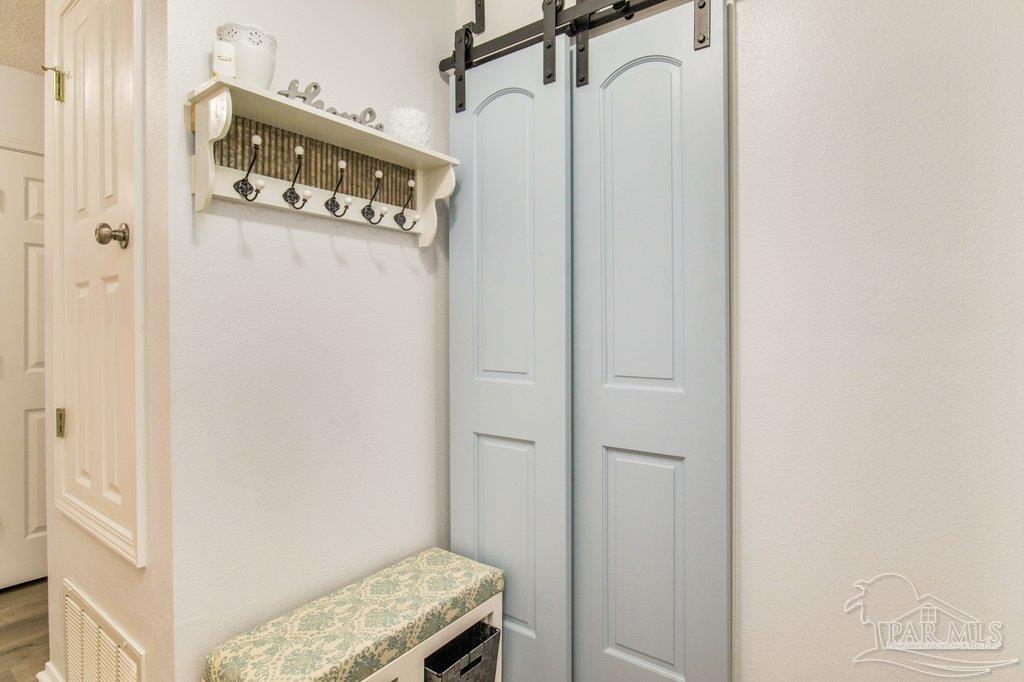 2466 Redoubt Avenue Pensacola, FL 32507 - Photo 12 of 27 a utility room with dryer and washer