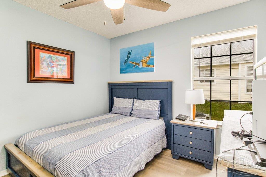 2466 Redoubt Avenue Pensacola, FL 32507 - Photo 19 of 27 a bedroom with a bed and a window