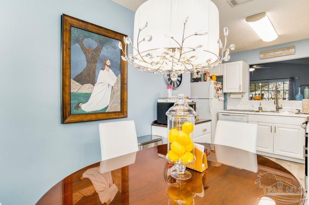 2466 Redoubt Avenue Pensacola, FL 32507 - Photo 10 of 27 a view of a living room with a bathroom