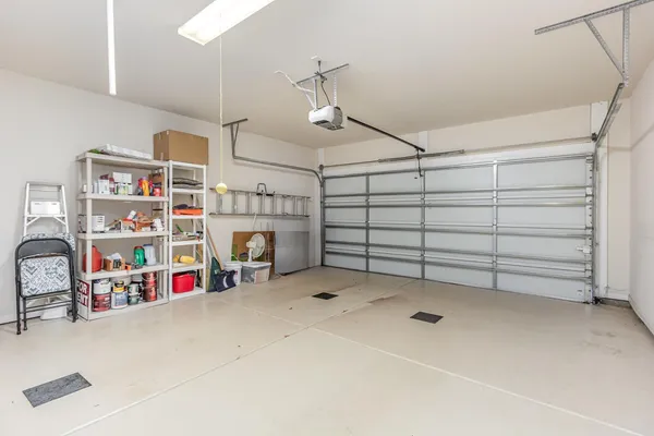 a view of a garage with storage