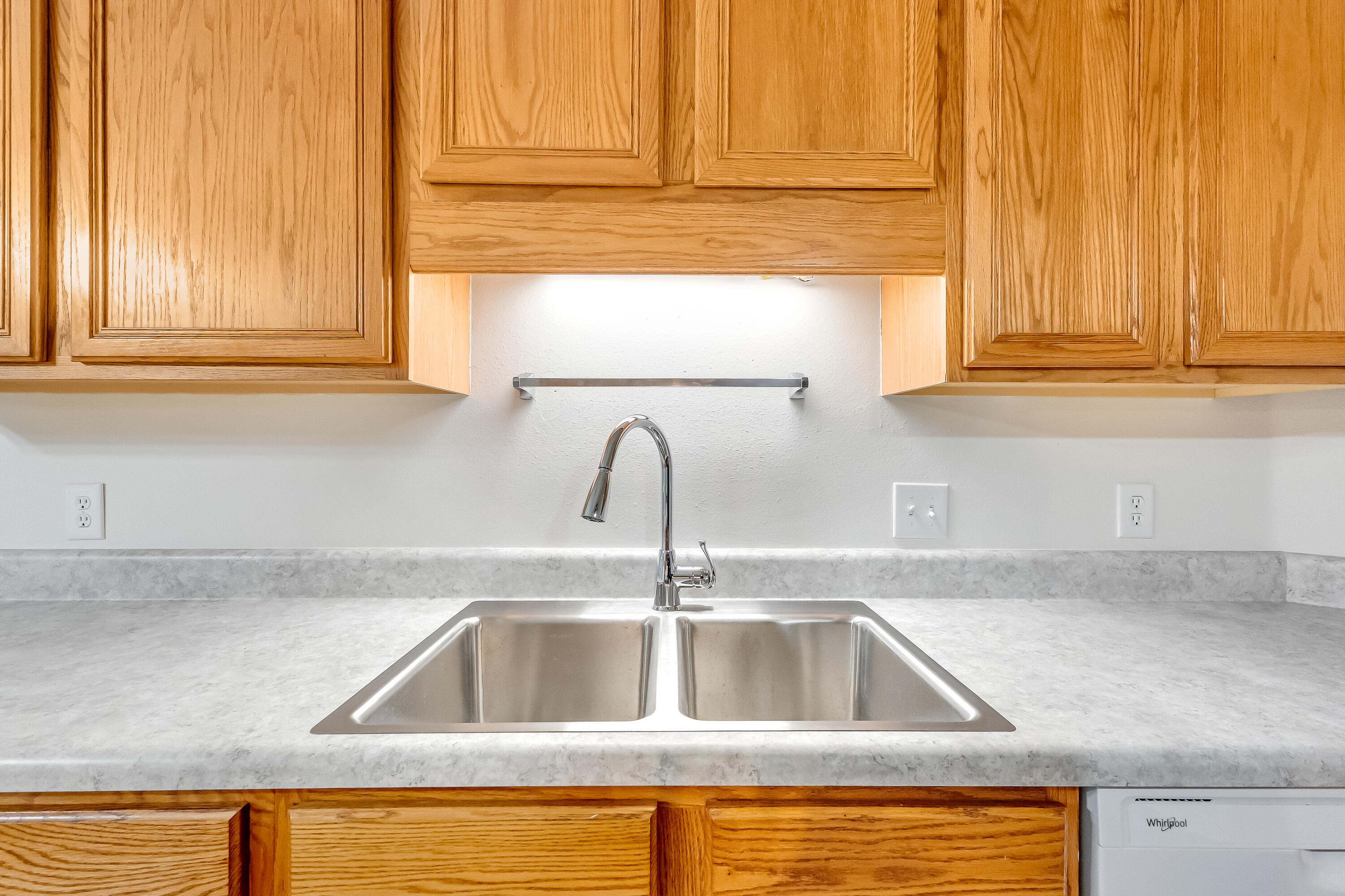 427 Hatchee Drive Crestview, FL 32536 - Photo 17 of 77 a kitchen with granite countertop a sink and a window