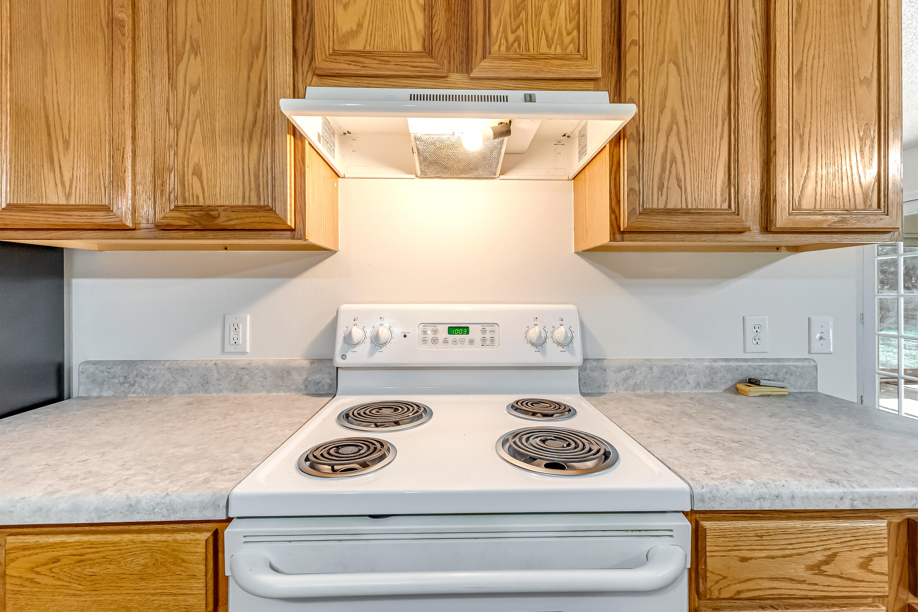 427 Hatchee Drive Crestview, FL 32536 - Photo 23 of 77 a stove top oven sitting inside of a kitchen