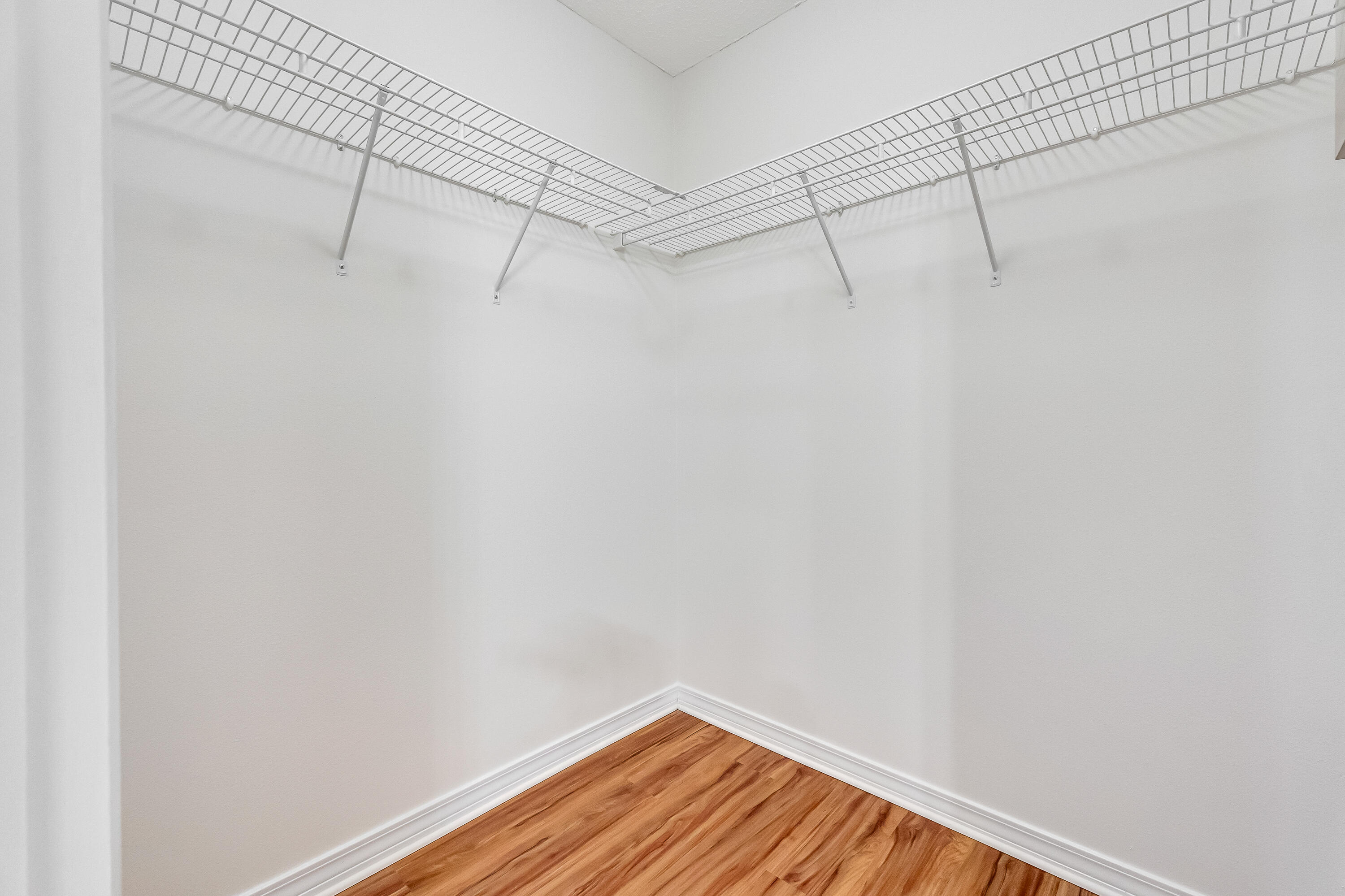 427 Hatchee Drive Crestview, FL 32536 - Photo 38 of 77 a view of a room with racks on the wall