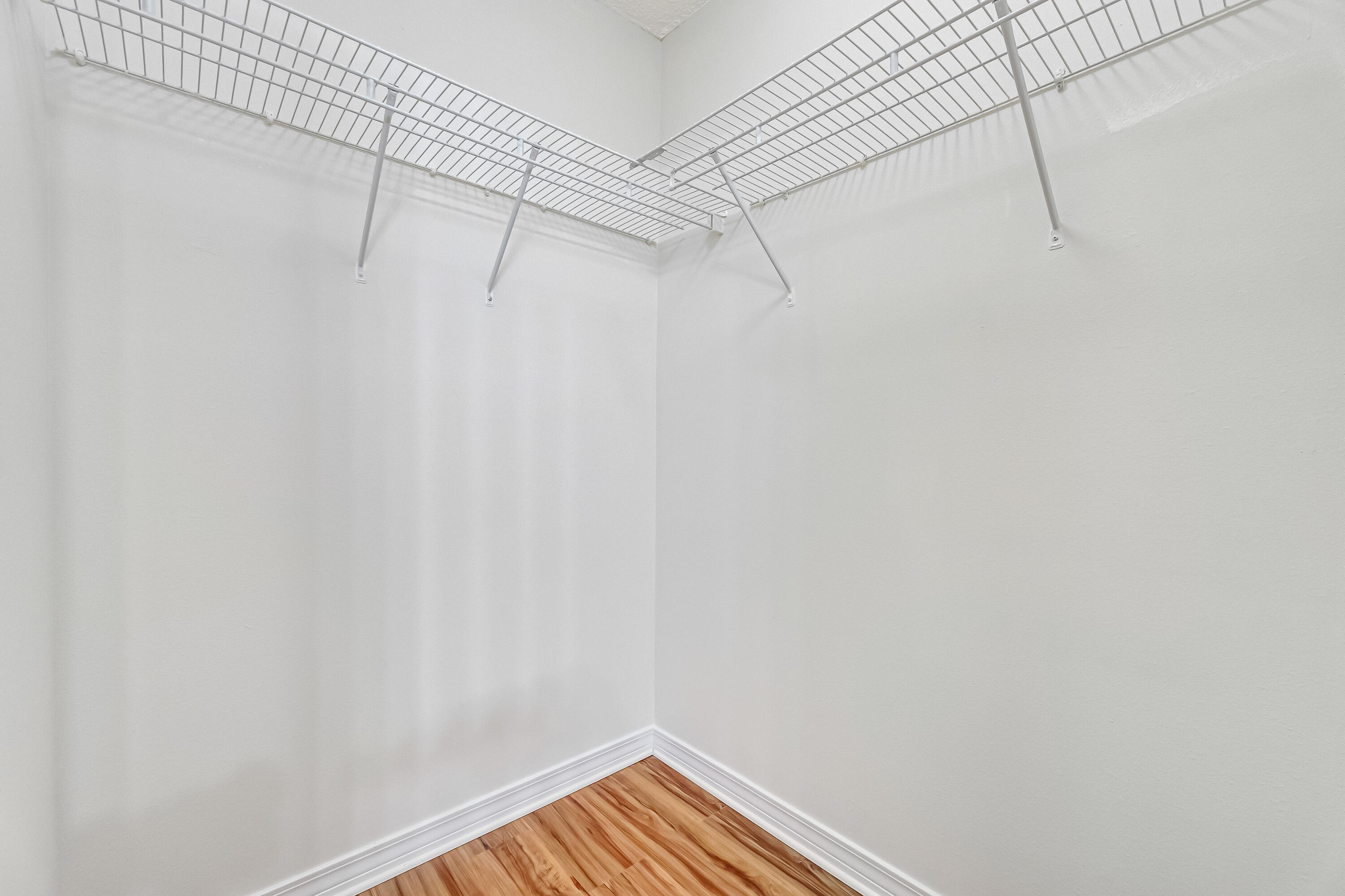 427 Hatchee Drive Crestview, FL 32536 - Photo 39 of 77 a view of a room with racks on the wall