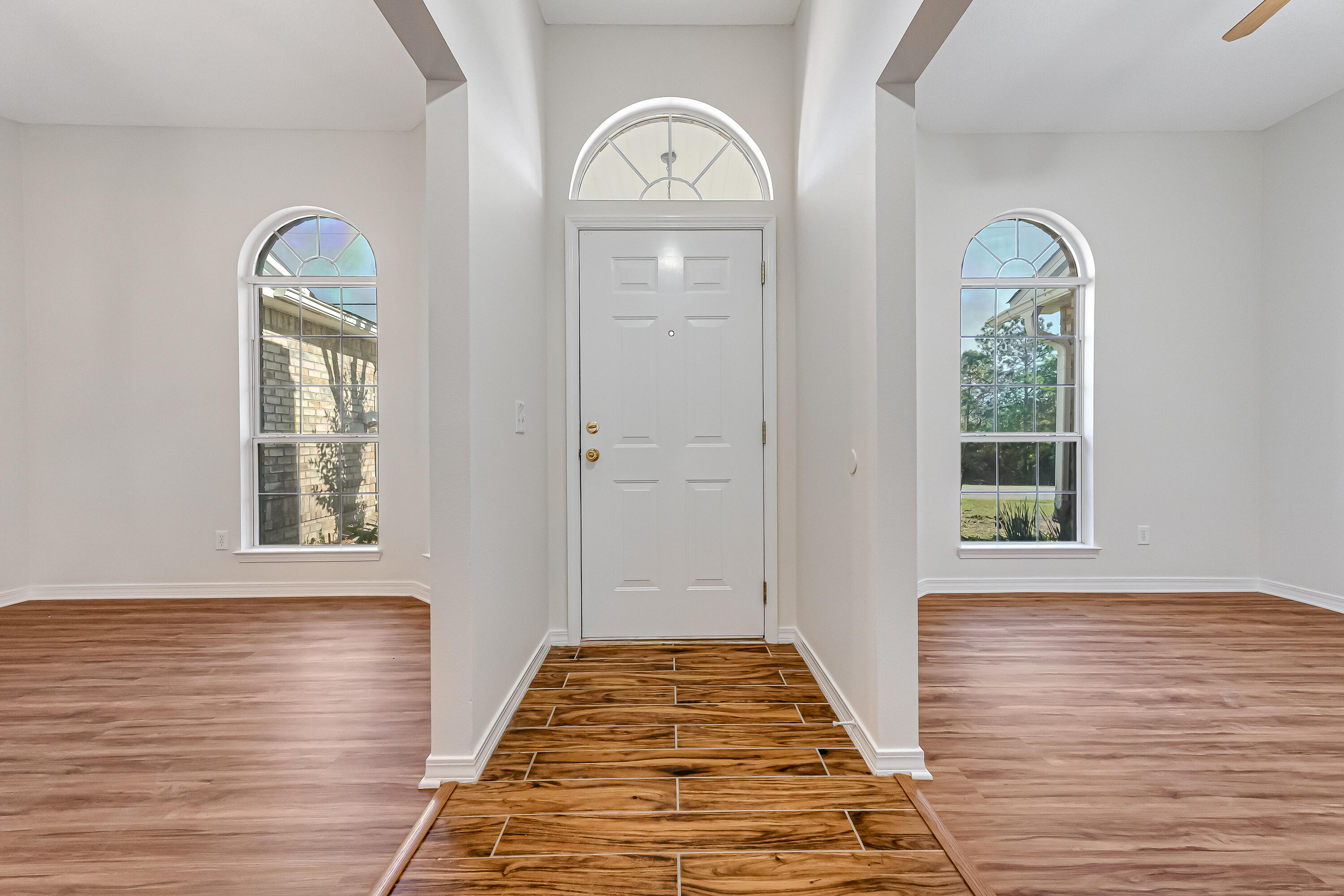 427 Hatchee Drive Crestview, FL 32536 - Photo 4 of 77 a view of front door with wooden floor