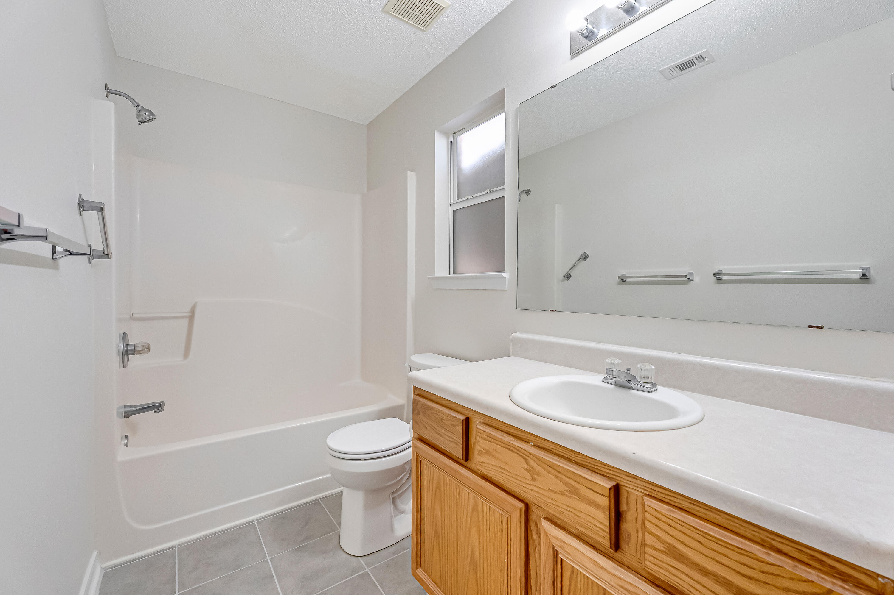 427 Hatchee Drive Crestview, FL 32536 - Photo 44 of 77 a bathroom with a sink a toilet and shower