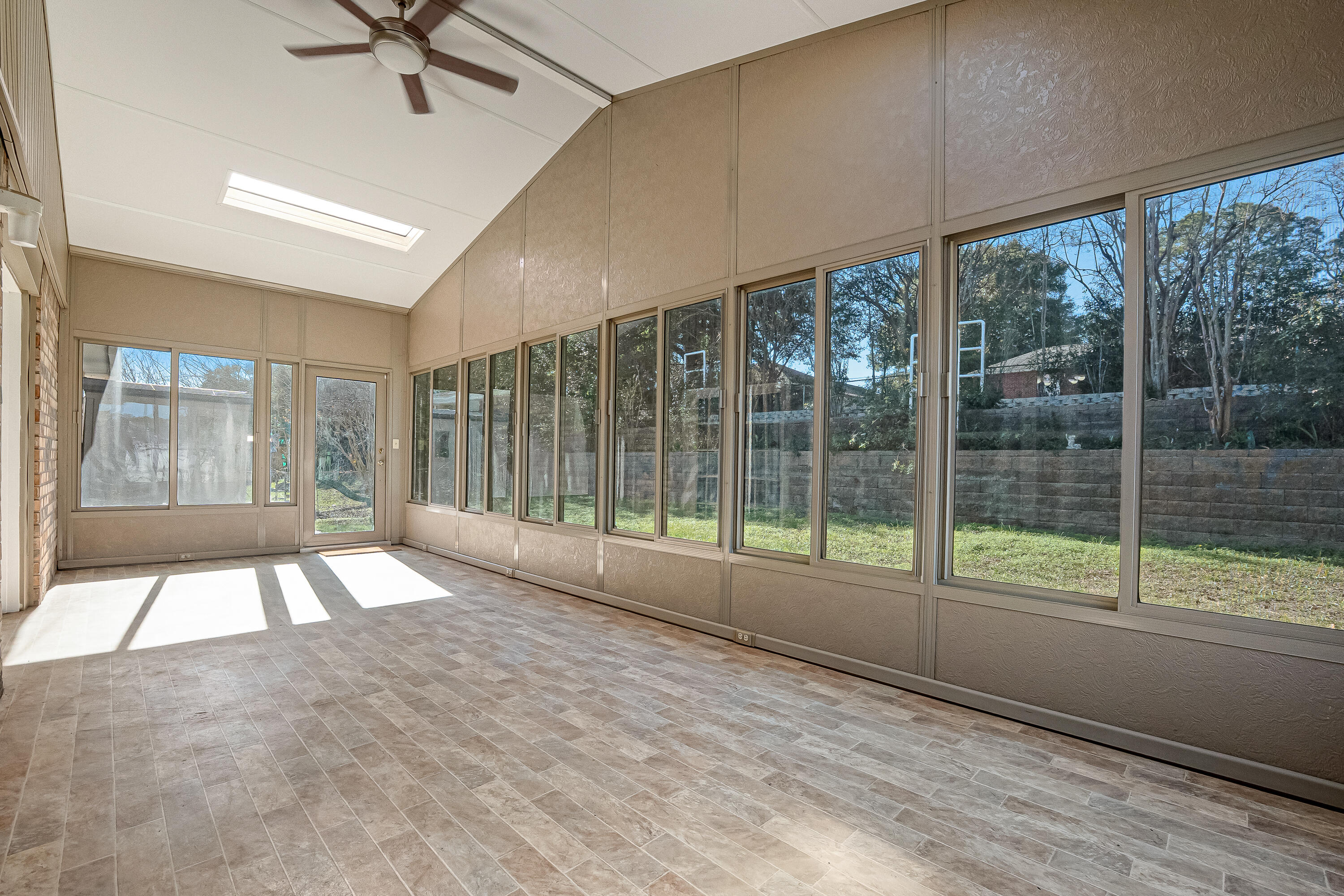 427 Hatchee Drive Crestview, FL 32536 - Photo 53 of 77 a view of an empty room with a balcony