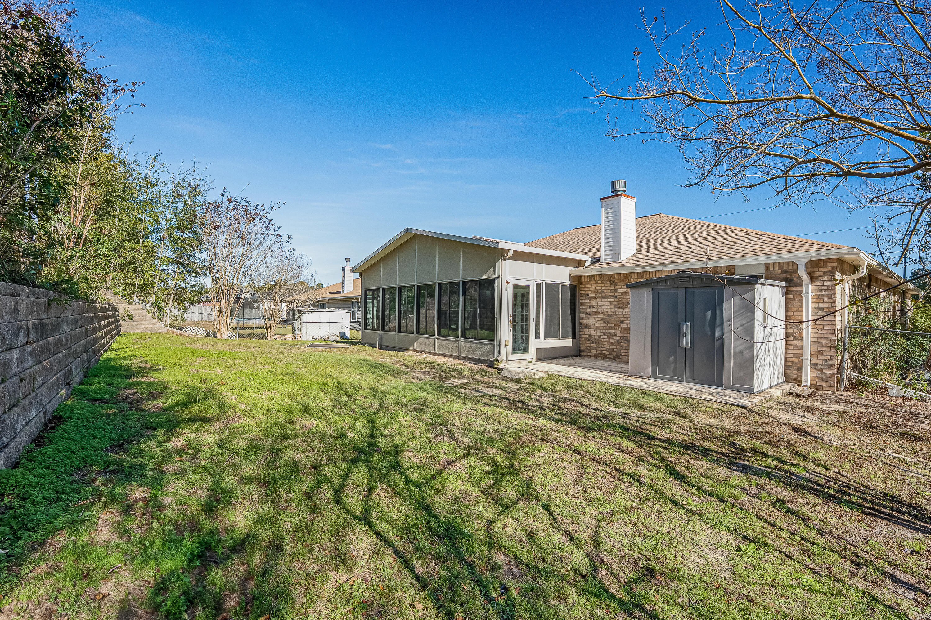 427 Hatchee Drive Crestview, FL 32536 - Photo 72 of 77 a front view of a house with a yard