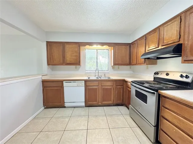 a bathroom with a sink a bathtub and shower