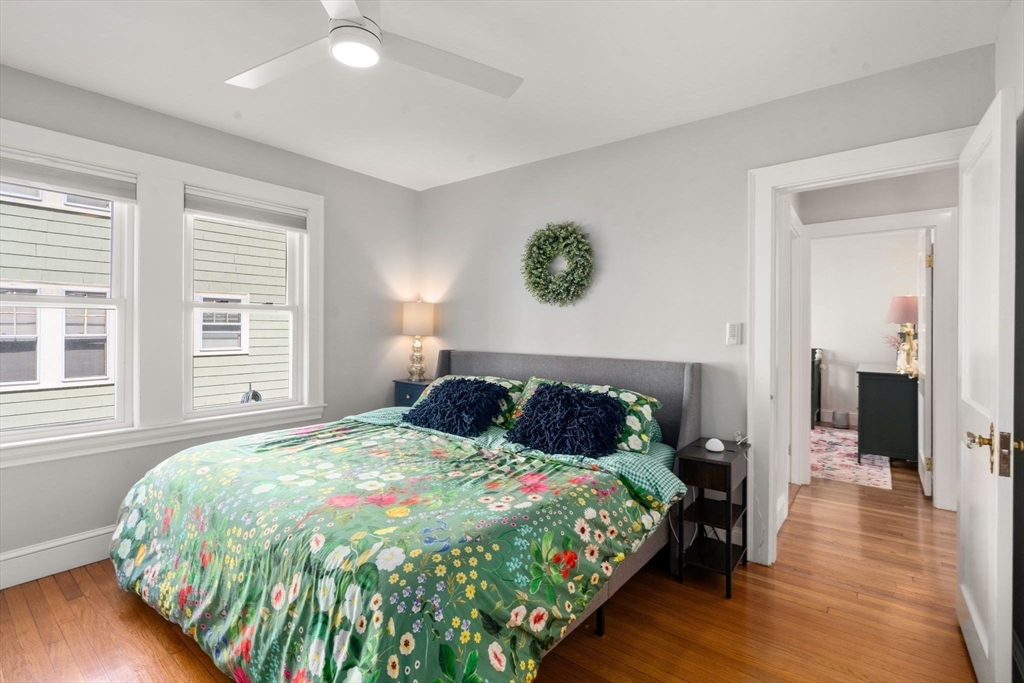 9 Dunton Road, Unit 9 Watertown, MA 02472 - Photo 16 of 39 a bedroom with a bed and a window