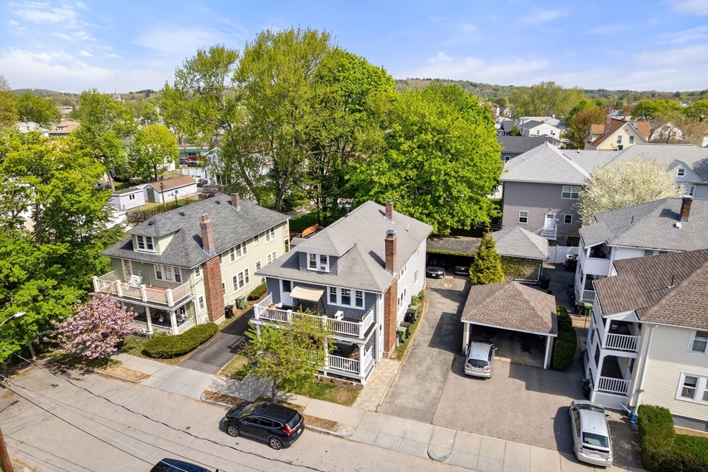 9 Dunton Road, Unit 9 Watertown, MA 02472 - Photo 30 of 39 an aerial view of residential houses with outdoor space and parking