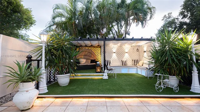 a view of a park with plants and trees