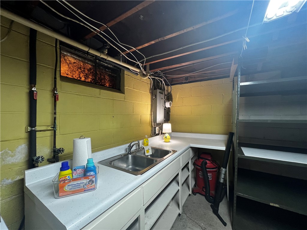 718 Taylor Road Horseheads, NY 14845 - Photo 35 of 46 Great Laundry Space With Sink and Cabinet Space
