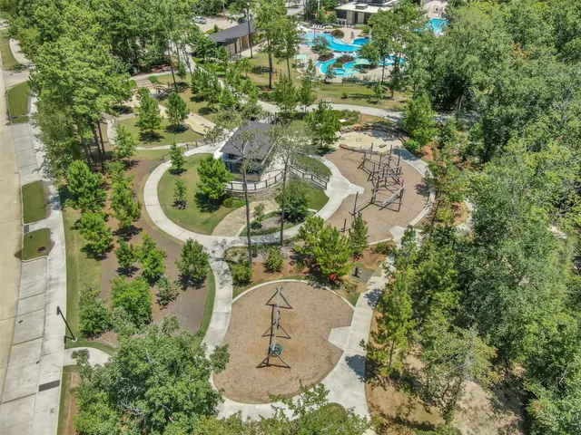 a view of a kitchen with a table and chairs