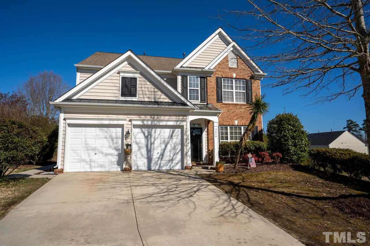 3314 Colorcott Street Raleigh, NC 27614 - Photo 1 of 12 a front view of a house with a yard