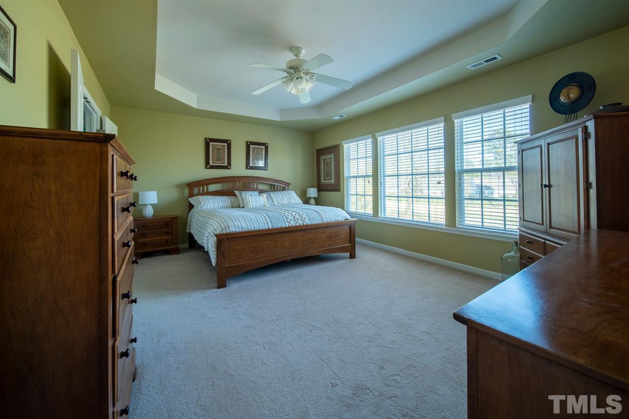 3314 Colorcott Street Raleigh, NC 27614 - Photo 7 of 12 a bedroom with a bed and a window