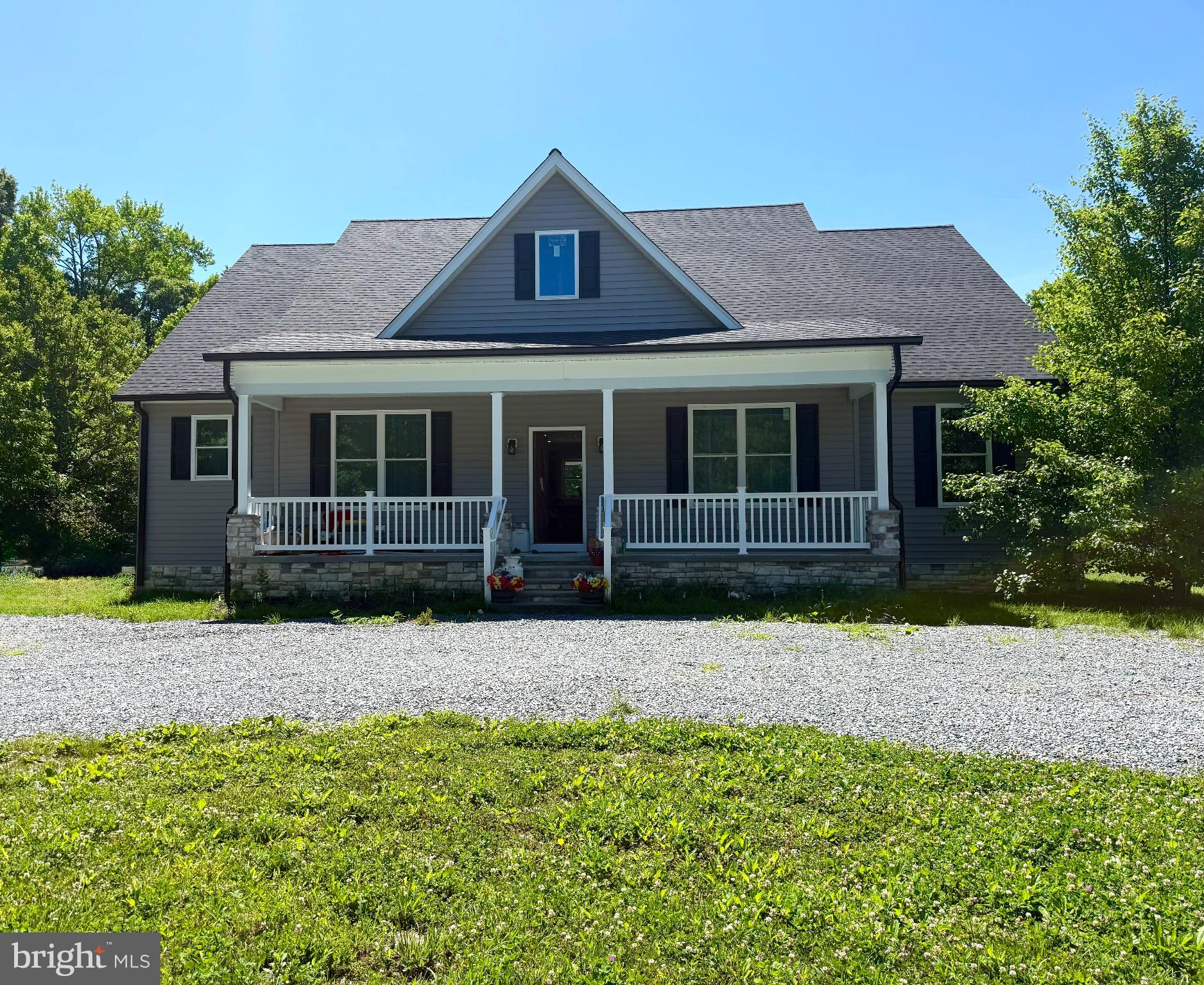 Charming home with inviting porch.