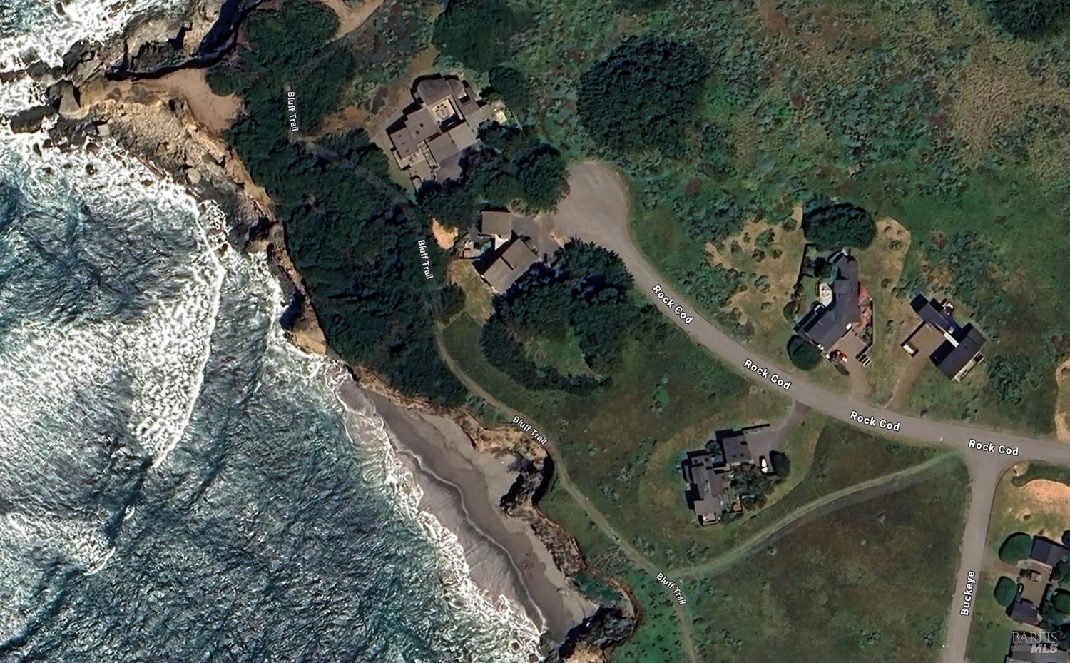 42179 Rock Cod The Sea Ranch, CA 95497 - Photo 2 of 28 an aerial view of a house with a yard