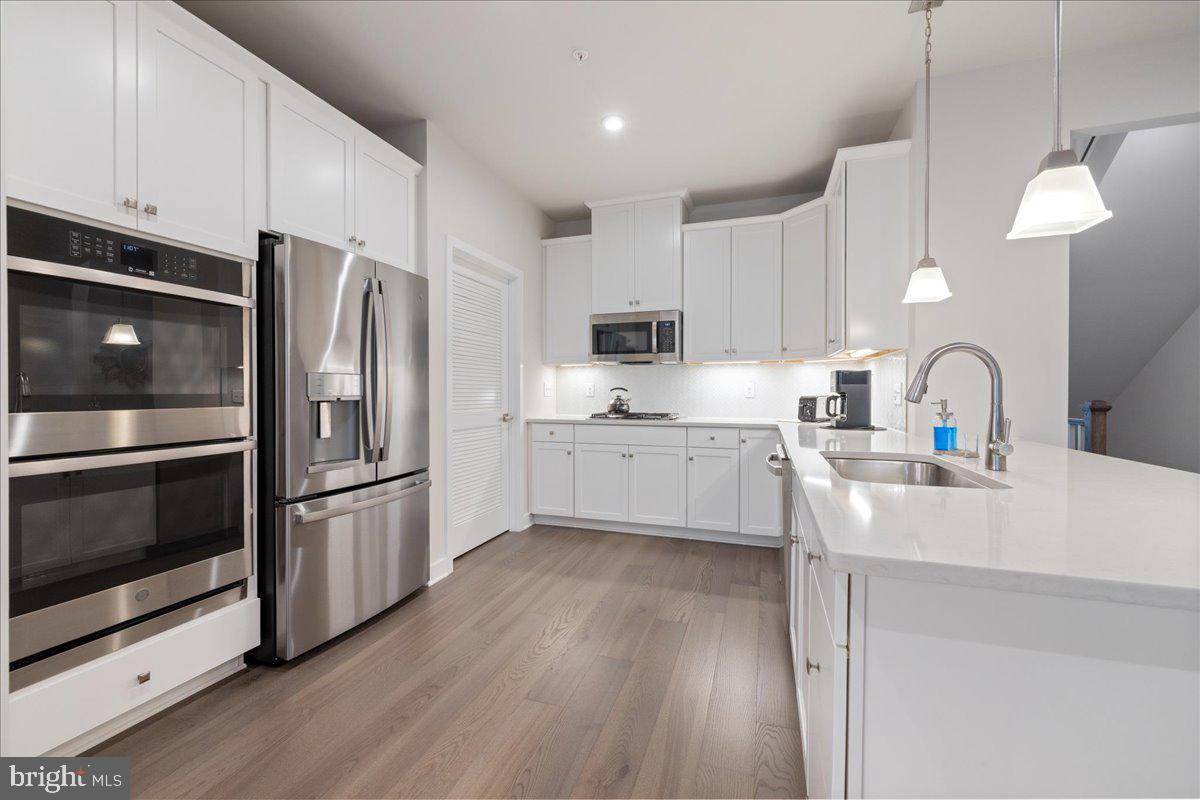 34 Griffin Way Yardley, PA 19067 - Photo 11 of 50 a kitchen with stainless steel appliances a refrigerator sink and microwave
