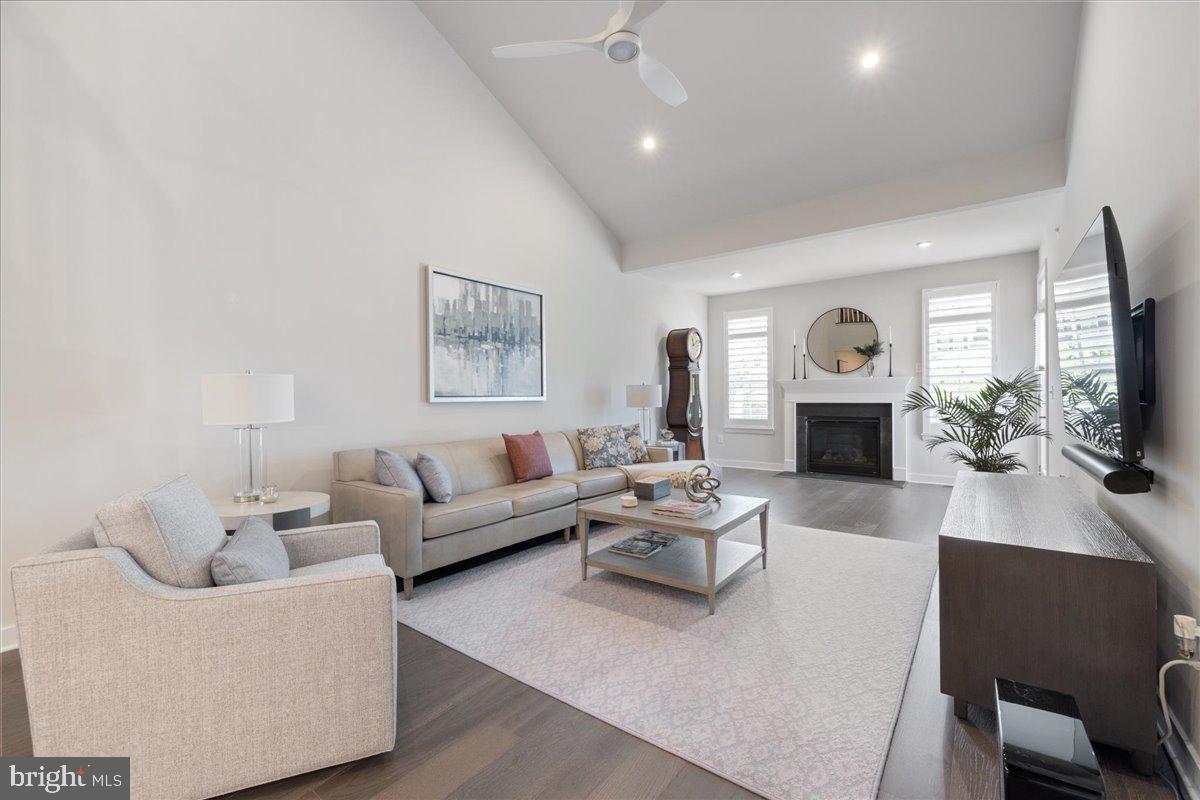 34 Griffin Way Yardley, PA 19067 - Photo 17 of 50 a living room with furniture a large window and a fireplace