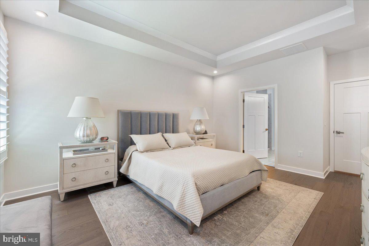 34 Griffin Way Yardley, PA 19067 - Photo 20 of 50 a bedroom with a bed and wooden floor