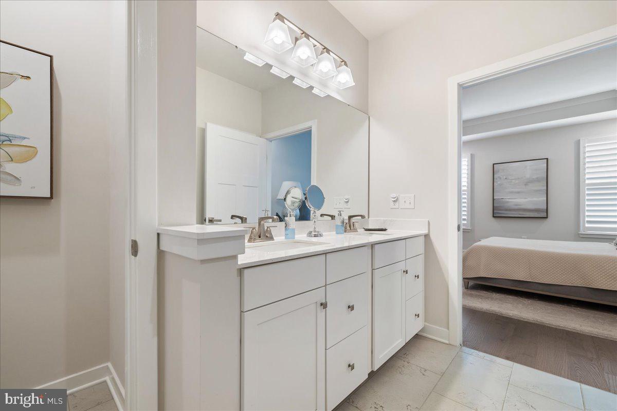 34 Griffin Way Yardley, PA 19067 - Photo 21 of 50 a en suite bathroom with a double vanity sink and a mirror