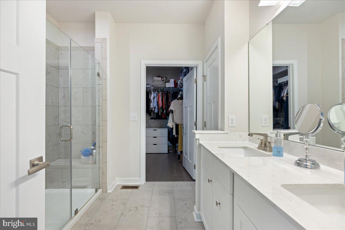 34 Griffin Way Yardley, PA 19067 - Photo 23 of 50 a spacious bathroom with a shower and a sink