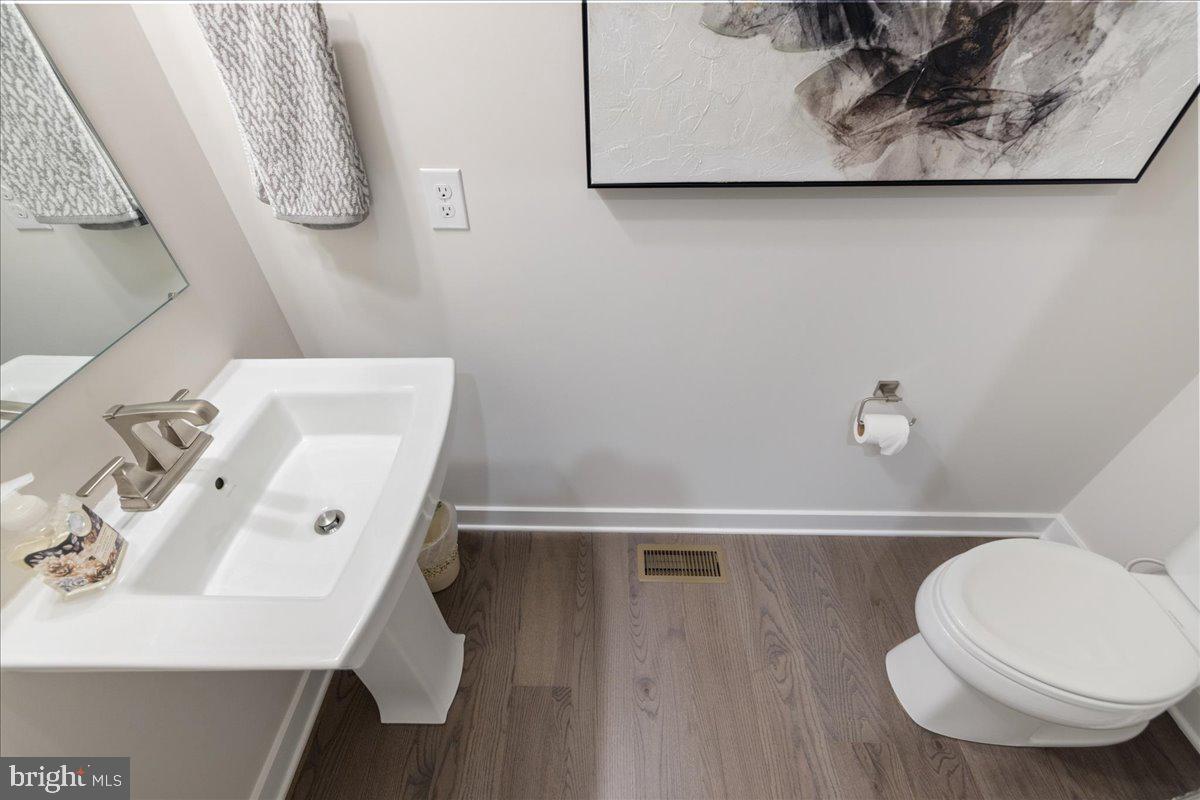 34 Griffin Way Yardley, PA 19067 - Photo 25 of 50 a bathroom with a sink and a toilet
