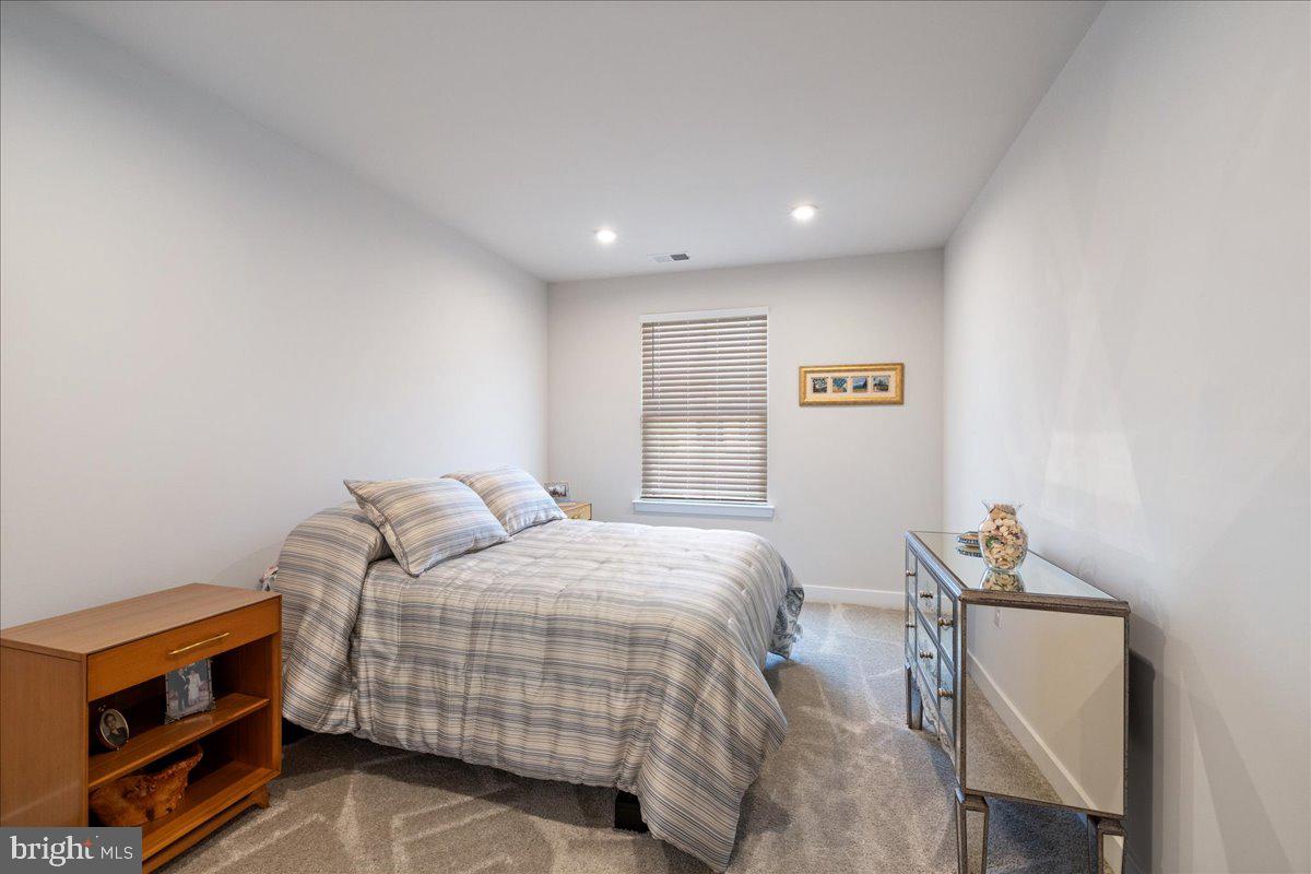 34 Griffin Way Yardley, PA 19067 - Photo 30 of 50 a bedroom with a bed and a dresser