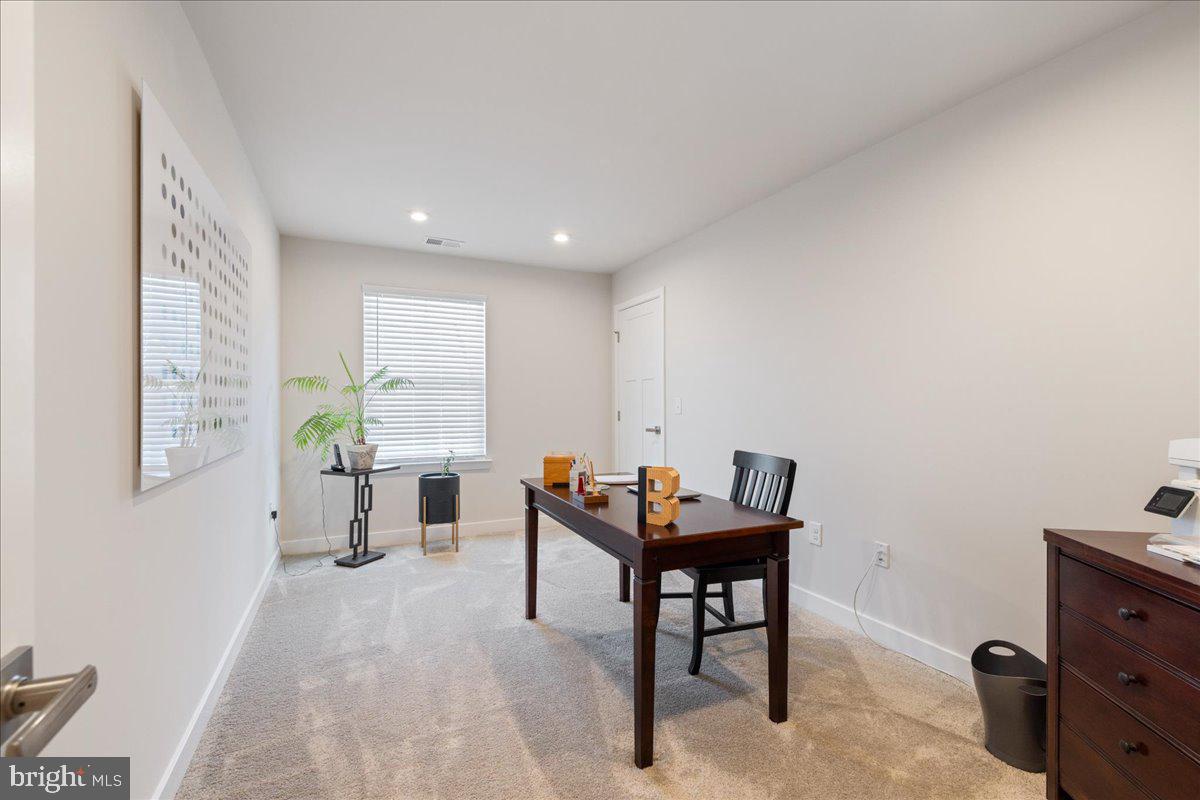 34 Griffin Way Yardley, PA 19067 - Photo 32 of 50 a living room with furniture and a dresser with wooden floor