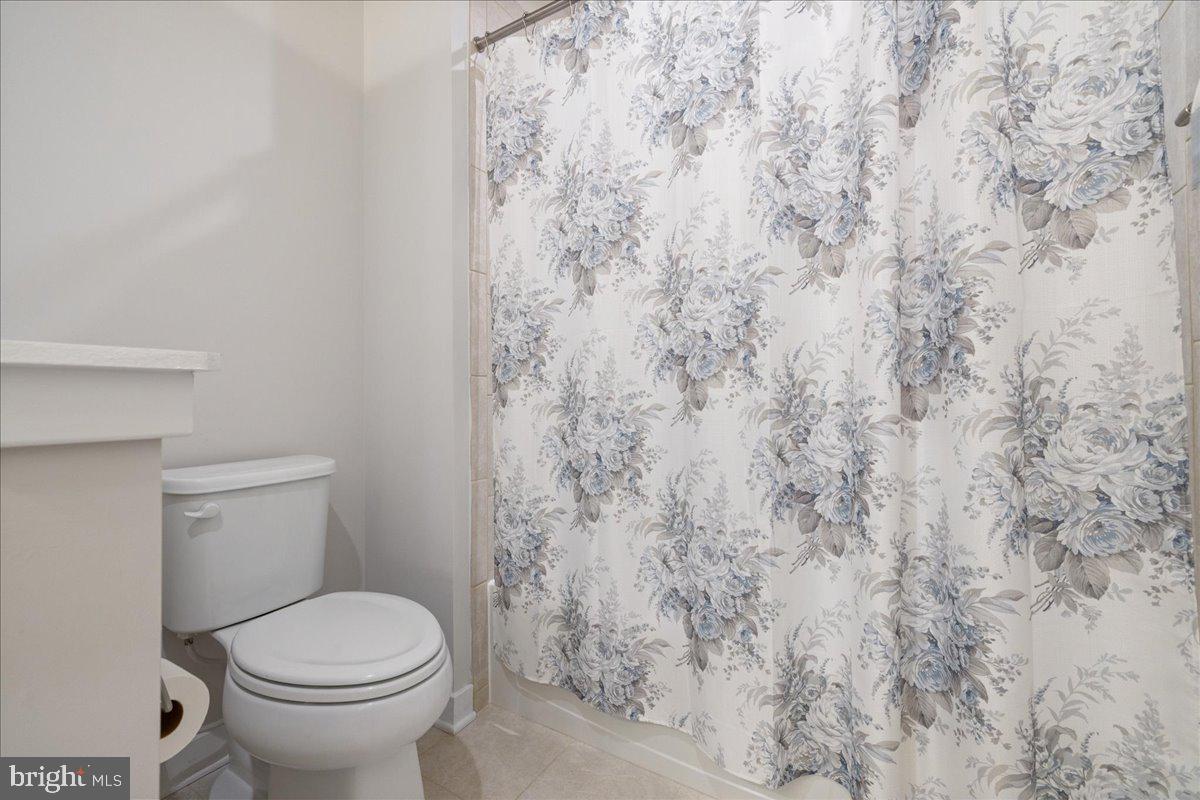 34 Griffin Way Yardley, PA 19067 - Photo 35 of 50 a white toilet sitting next to a shower