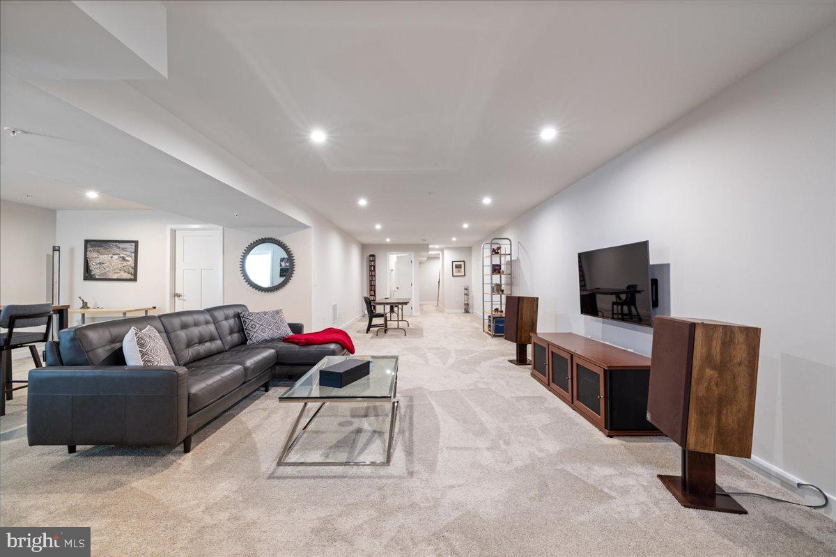 34 Griffin Way Yardley, PA 19067 - Photo 38 of 50 a living room with furniture and a flat screen tv