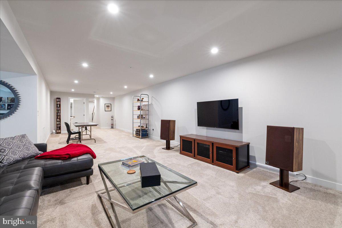 34 Griffin Way Yardley, PA 19067 - Photo 40 of 50 a living room with furniture and a flat screen tv