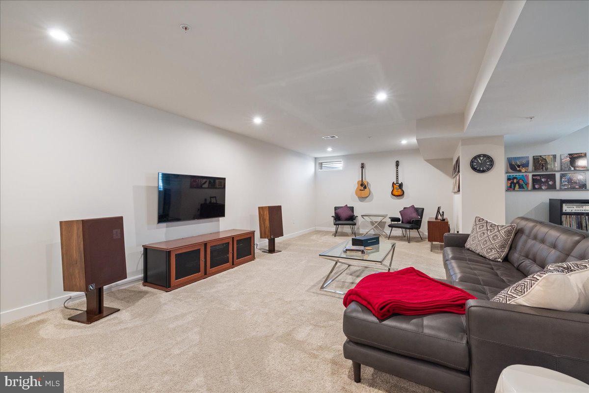 34 Griffin Way Yardley, PA 19067 - Photo 41 of 50 a living room with furniture and a flat screen tv