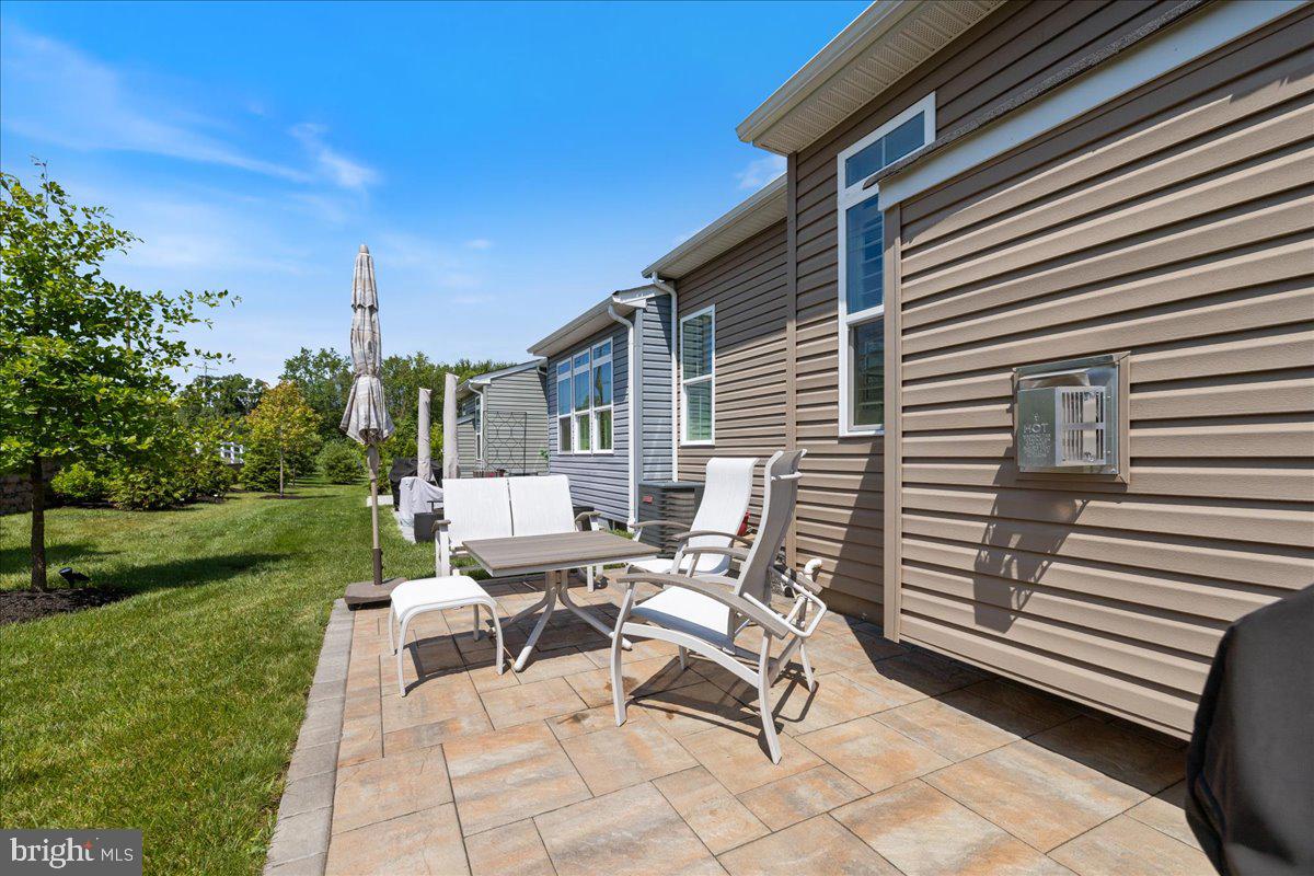 34 Griffin Way Yardley, PA 19067 - Photo 45 of 50 a view of backyard with outdoor seating and green space