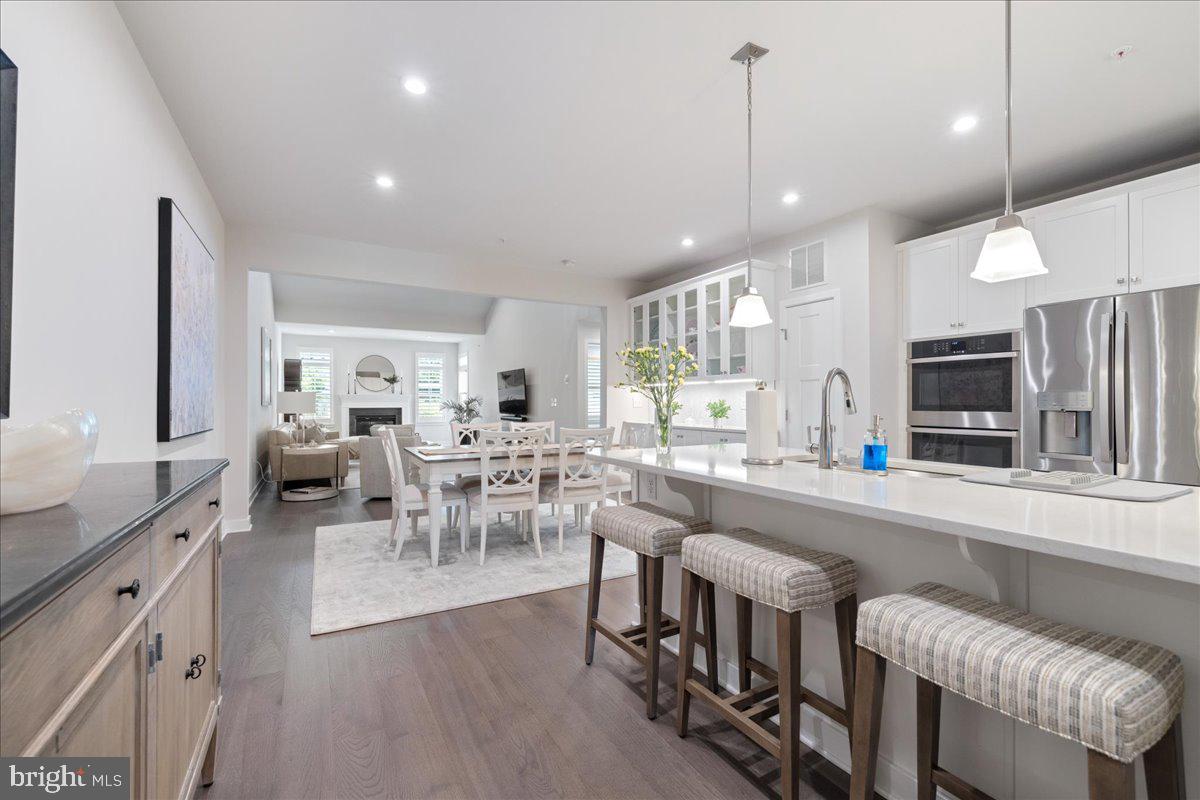 34 Griffin Way Yardley, PA 19067 - Photo 7 of 50 a large kitchen with a table and chairs