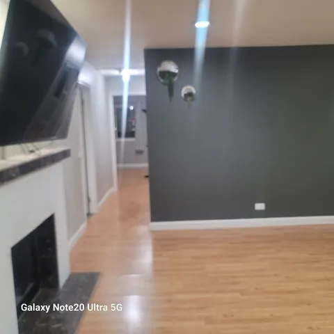 a view of a living room with a flat screen tv